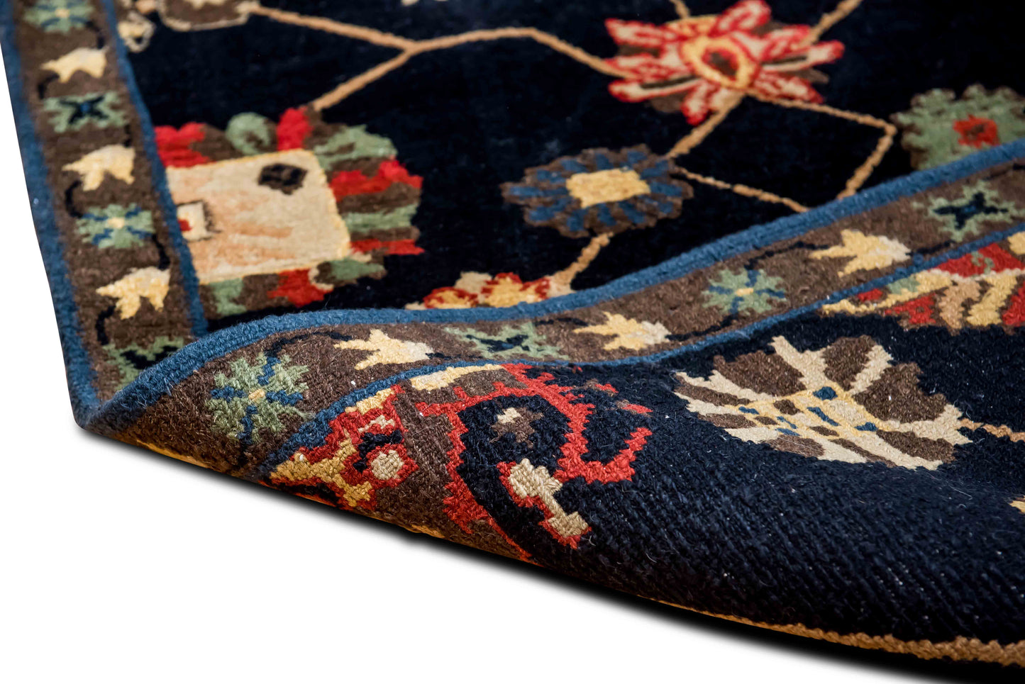 Tufenkian – 5 ft x 3 ft – wool – black red gold green blue