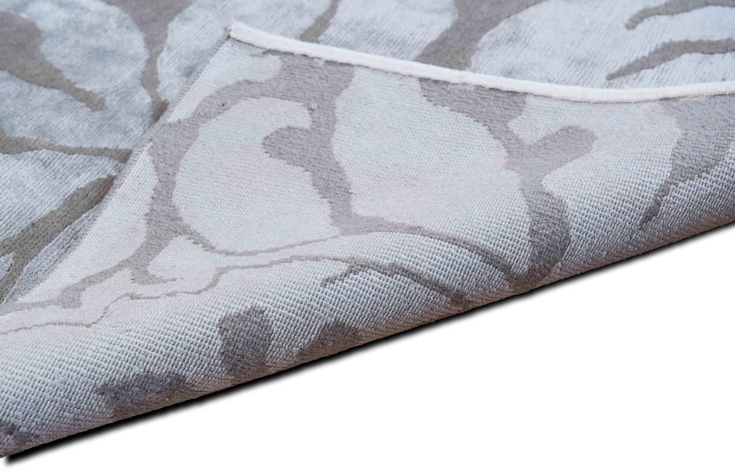 Tufenkian –  8' 4" ft x 5' 6"  – 100% wool  – beige ivory