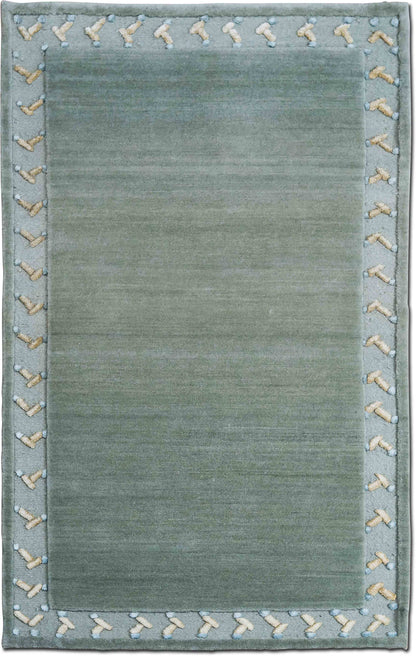 Tufenkian –  5 ft x 3 ft – 100% wool – brown cream trim