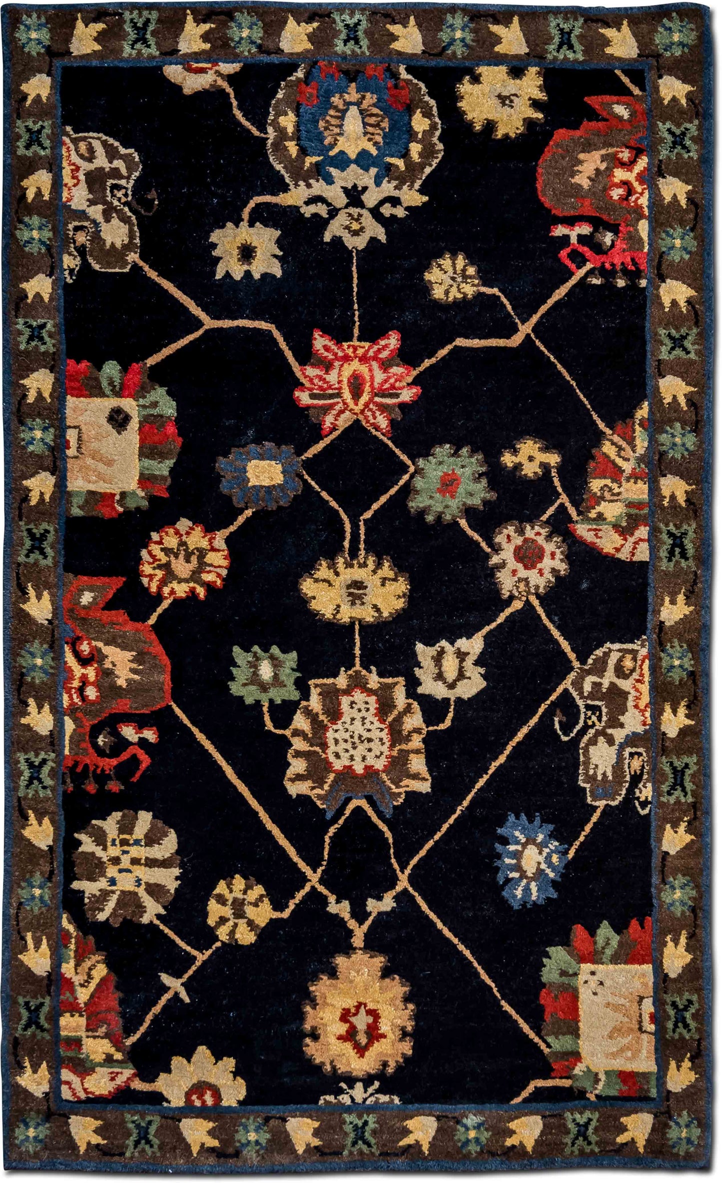 Tufenkian –  5 ft x 3 ft – wool – black red gold green blue