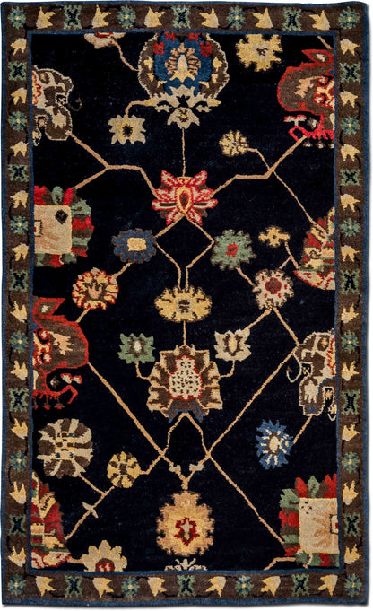 Tufenkian –  5 ft x 3 ft – wool – black red gold green blue