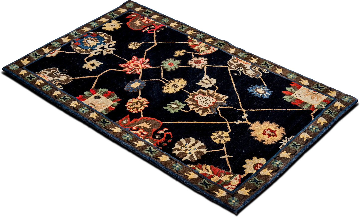 Tufenkian –  5 ft x 3 ft – wool – black red gold green blue