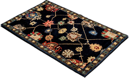 Tufenkian –  5 ft x 3 ft – wool – black red gold green blue